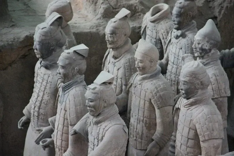 Close view of terracotta warriors, each with a distinct face, hairstyle and expression