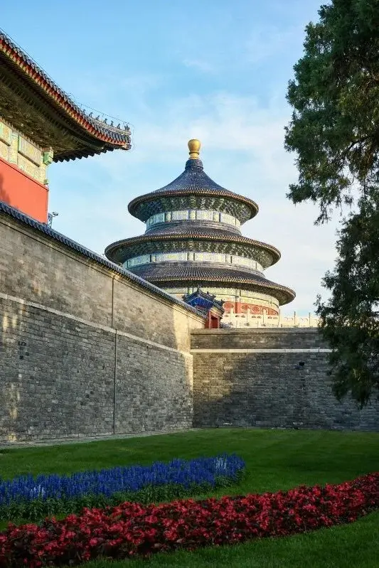 The triple-tiered blue-and-gold dome of the Temple of Heaven's Hall of Prayer in Beijing