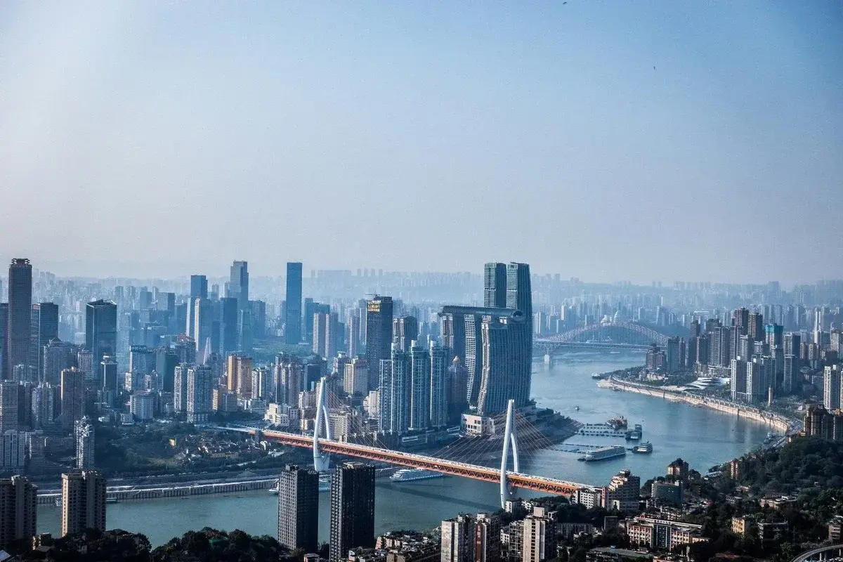 Chongqing skyline at the confluence of two rivers, seen at night