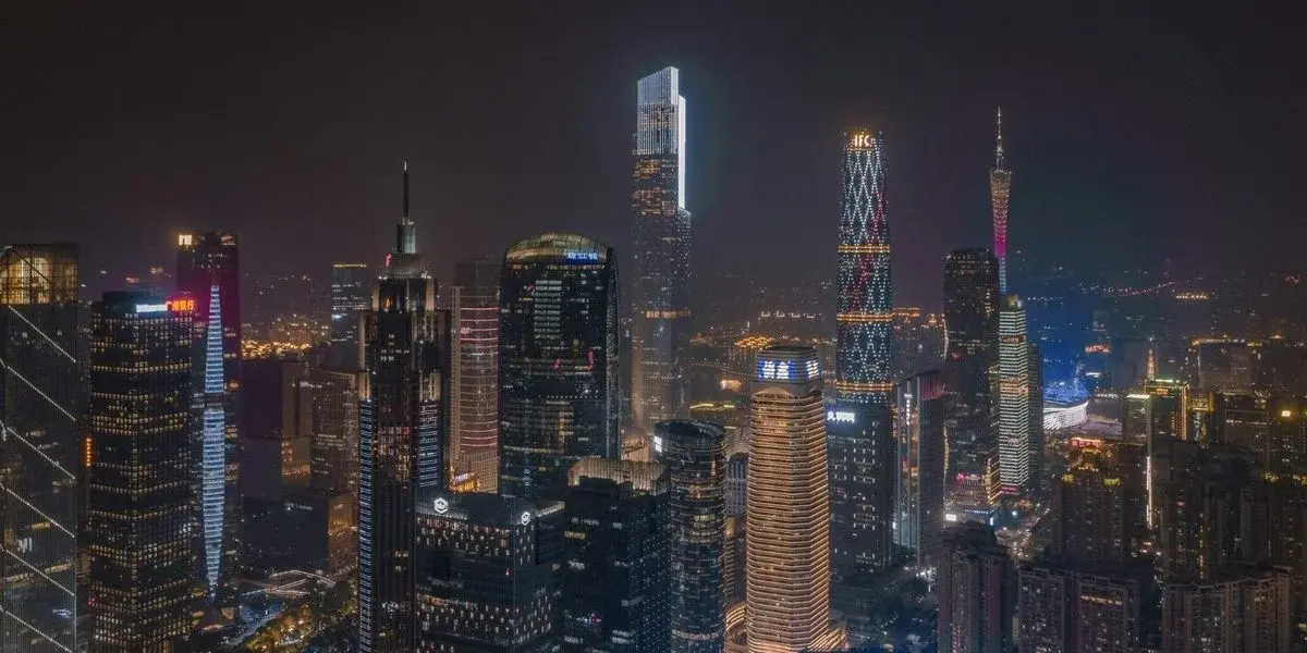 Guangzhou's Canton Tower lit at night above Zhujiang New Town