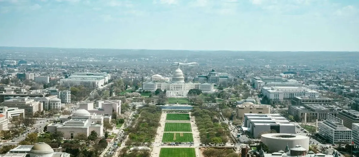 The U.S. Capitol dome above the National Mall, seen from the Washington Monument