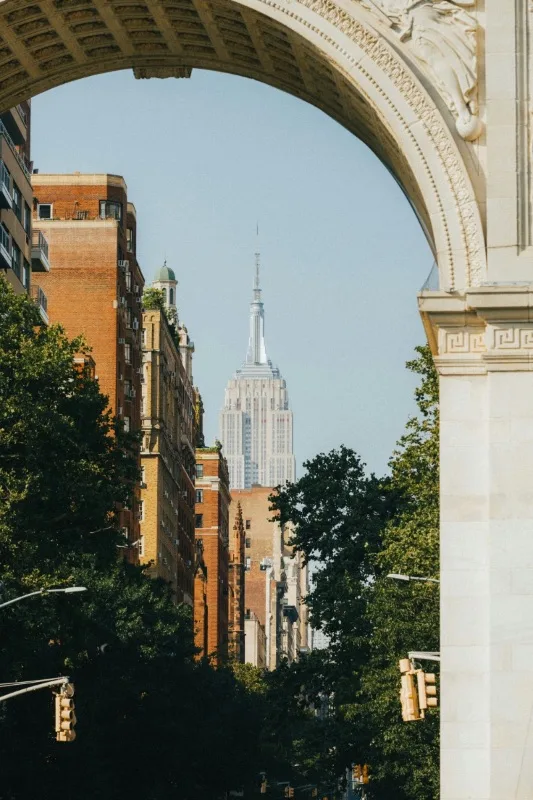 Washington Square Arch with the Empire State Building in the distance