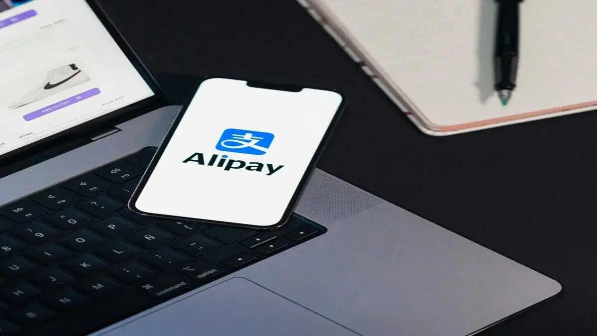 Close crop of a smartphone screen showing the Alipay app open