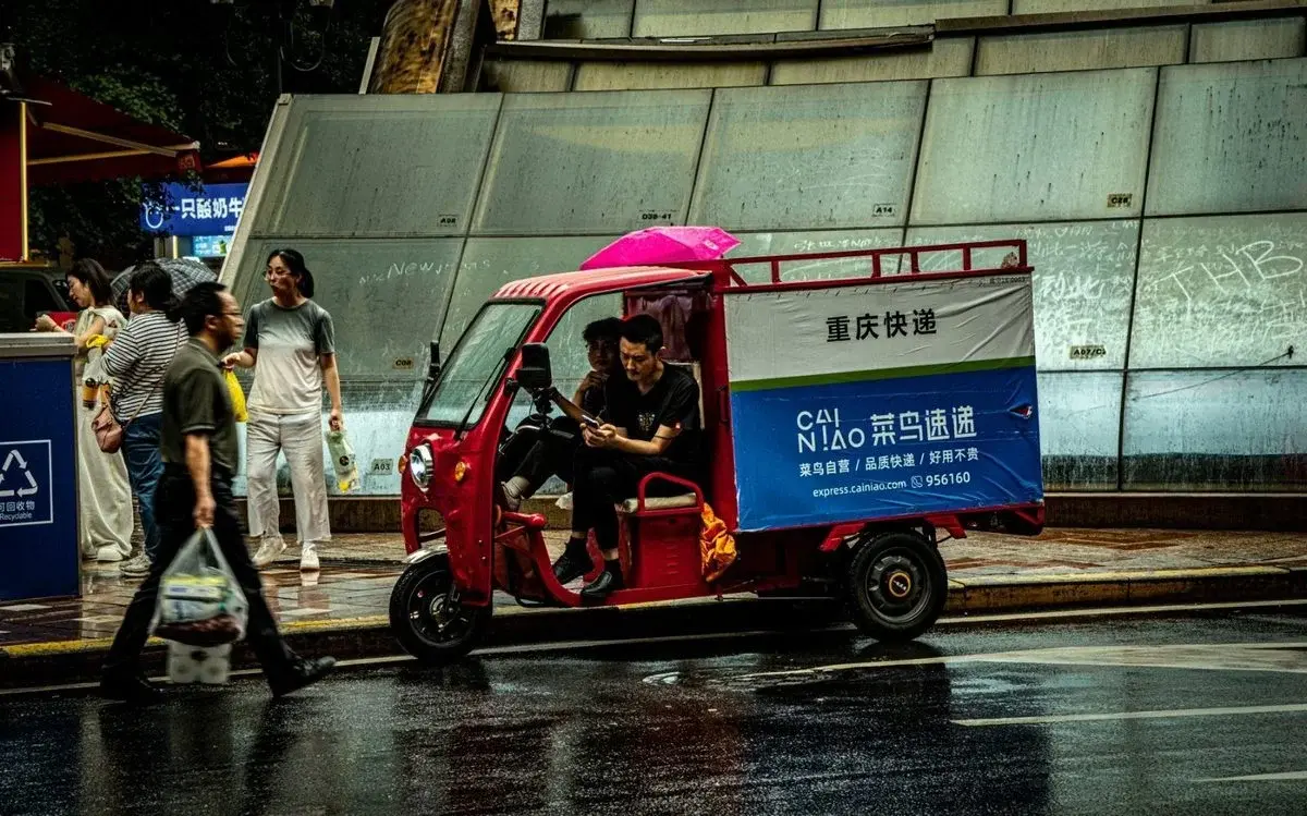 Cainiao Express delivery tricycle in Chongqing — China's urban courier logistics network