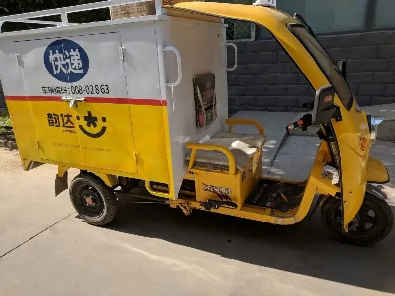 Yunda Express delivery tricycle — China's multi-platform courier network operating in parallel